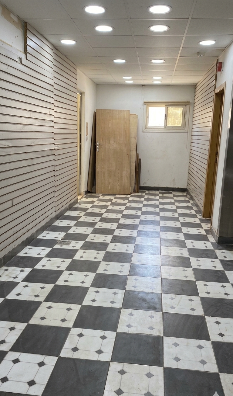محل للبيع فى المهندسين مؤجر بعائد شهرى 50م فى شارع السودان الرئيسى .